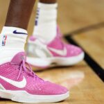 Feb 14, 2024; Phoenix, Arizona, USA; The details of the Nike sneakers of Phoenix Suns center Bol Bol (11) during the first half of the game against the Detroit Pistons at Footprint Center. Mandatory Credit: Joe Camporeale-USA TODAY Sports