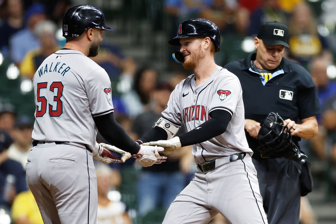 Pavin Smith (right) after 2-run homer.