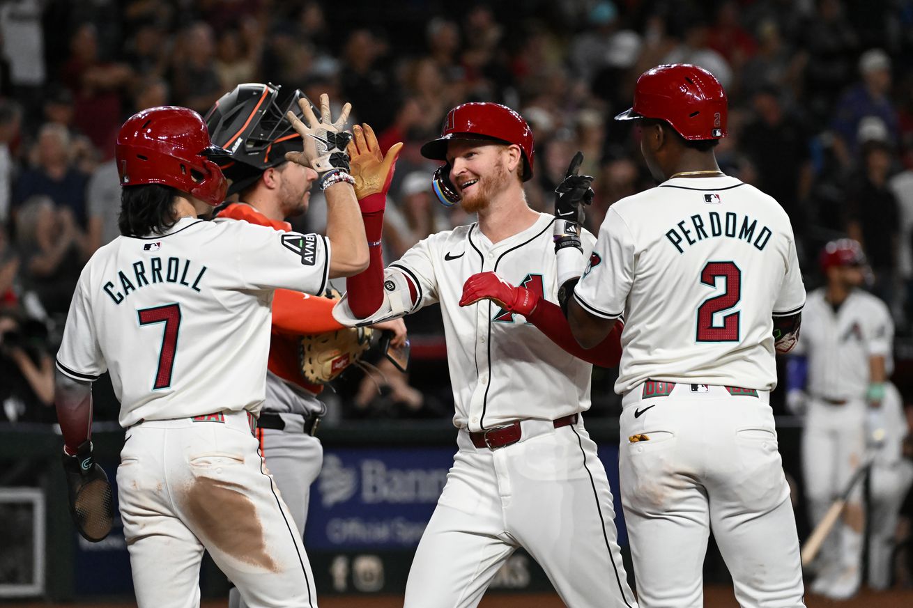 Pavin Smith celebrates a 3-run homer.