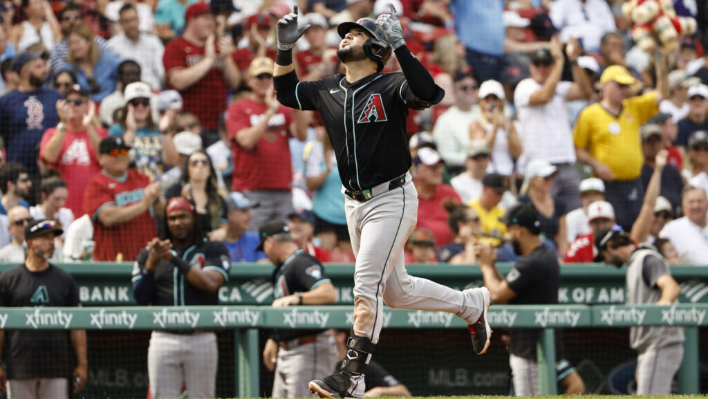 Arizona Diamondbacks Eugenio Suarez pointing to sky after home run in Boston