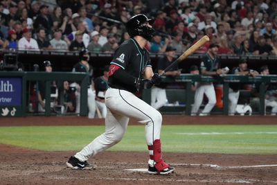 MLB: Philadelphia Phillies at Arizona Diamondbacks. Adrian Del Castillo watches the ball fly out to right field as he hits a walk-off home run against the Phillies on August 9