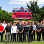 Diamondbacks executives, front office staff and special guests pose on Junior Noboa Field during the opening ceremony and dedication of the new Dominican Republic Academy on November 18, 2024 in Boca Chica, Dominican Republic. (Photo by Kelsey Grant/Arizona Diamondbacks)