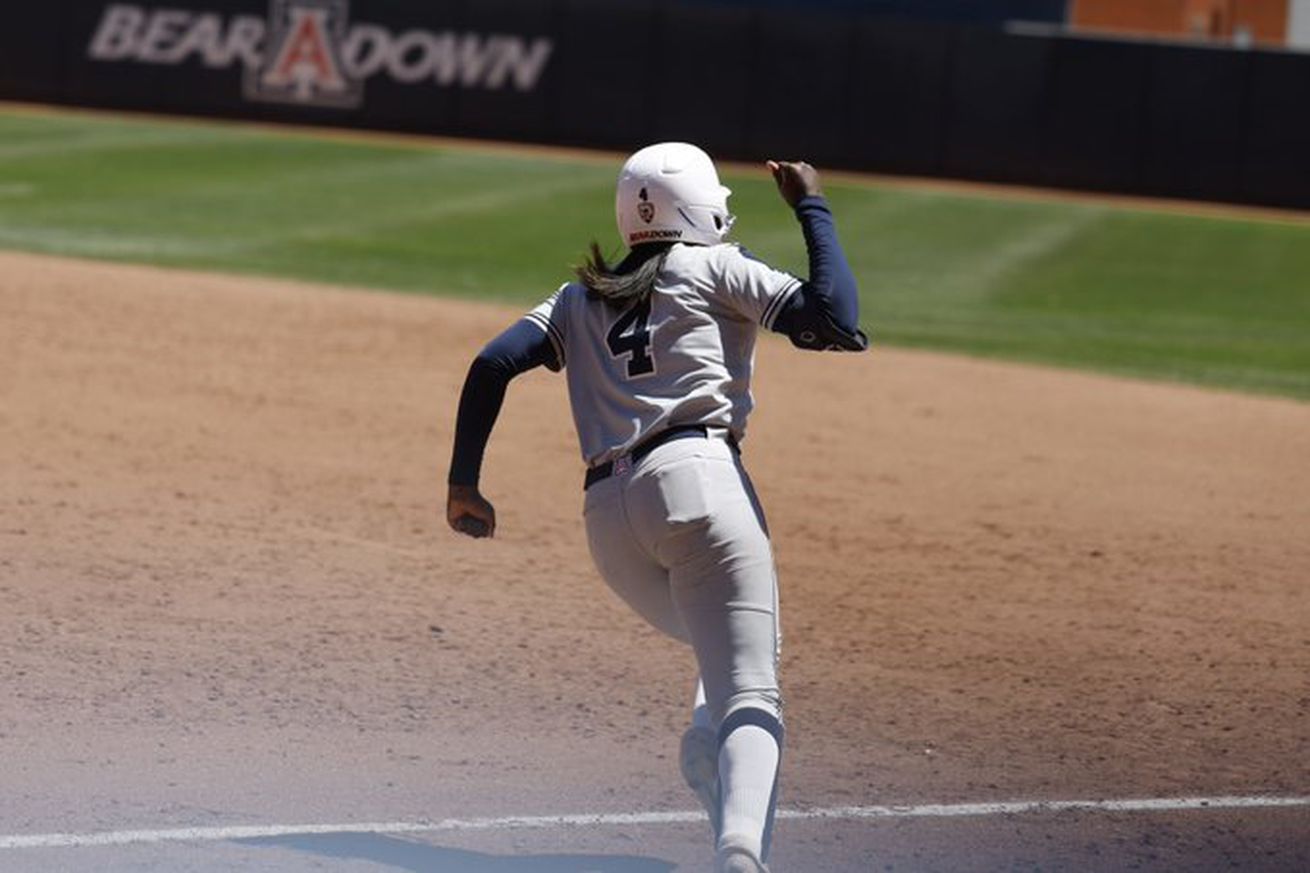 dakota kennedy runs the bases on softball field