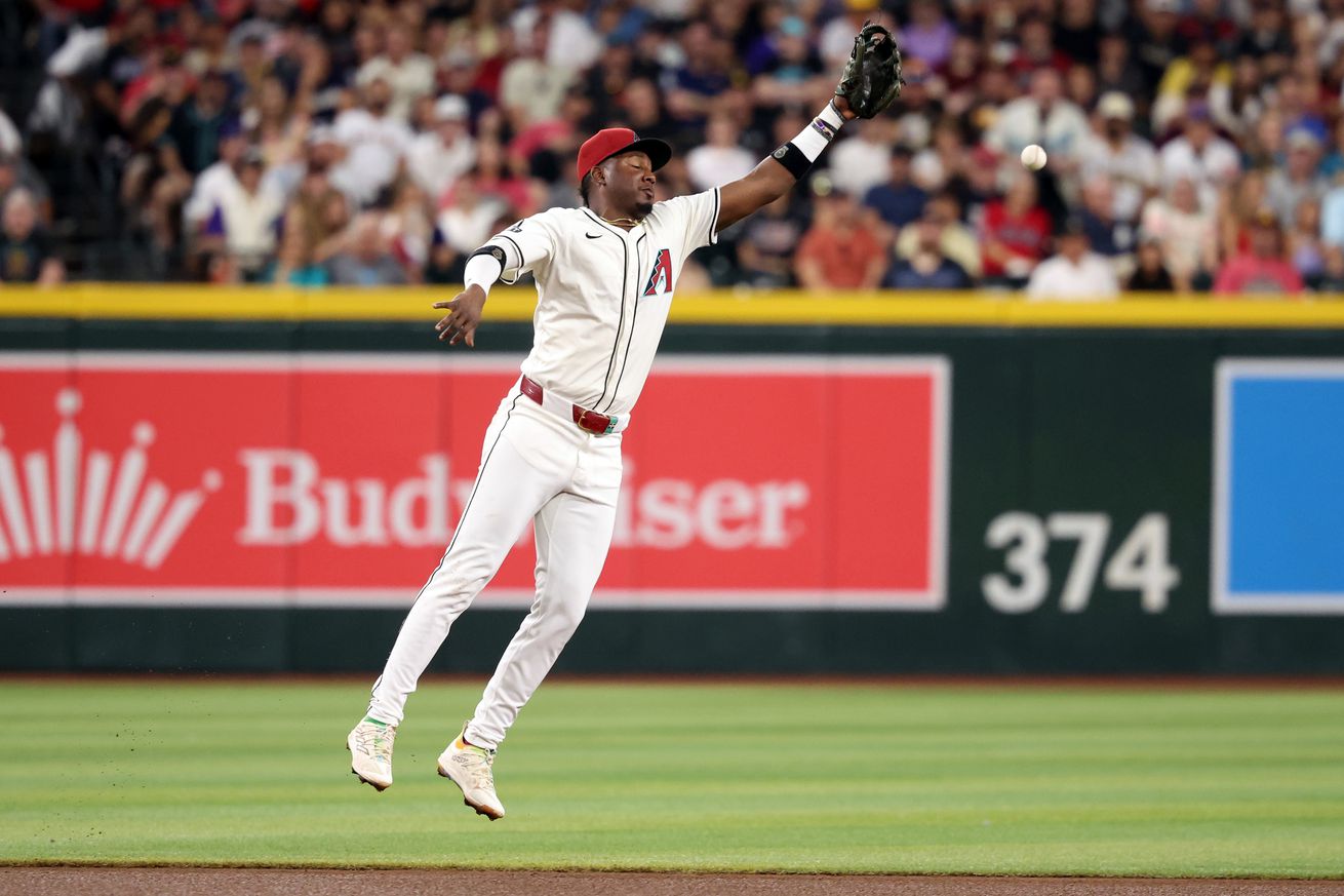 Perdomo challenged by a line drive.