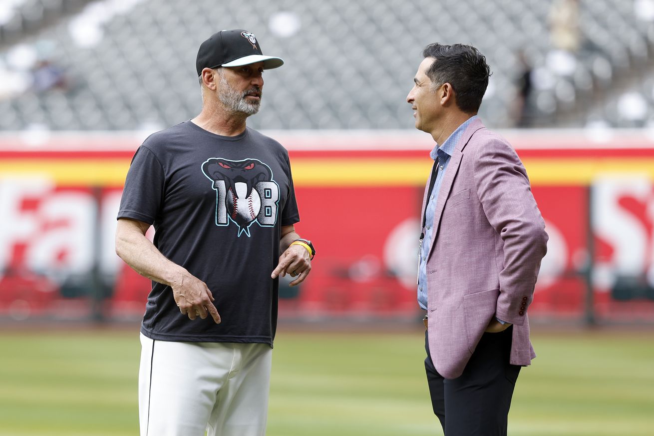 Torey Lovullo with GM Mike Hazen.