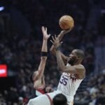 Phoenix Suns forward Kevin Durant shoots over the top over defender