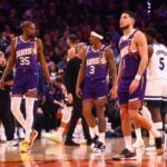 Phoenix Suns forward Kevin Durant (35) with guard Bradley Beal (3) and Devin Booker (1) against the Minnesota Timberwolves at Footprint Center.