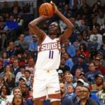 Feb 25, 2025; Memphis, Tennessee, USA; Phoenix Suns center Bol Bol (11) shoots for three during the third quarter against the Memphis Grizzlies at FedExForum. Mandatory Credit: Petre Thomas-Imagn Images